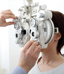 woman having eyes examined